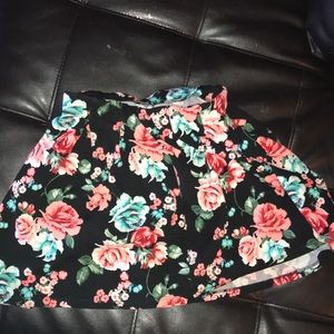 Black skirt with flowers size small.
